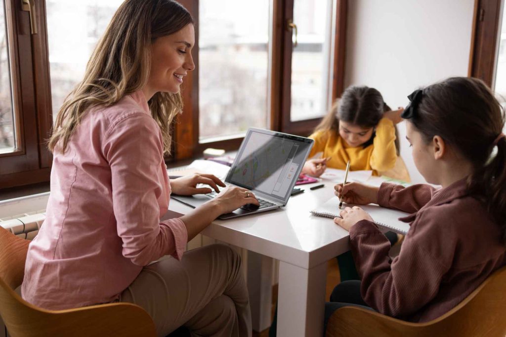 mother and two children working from home